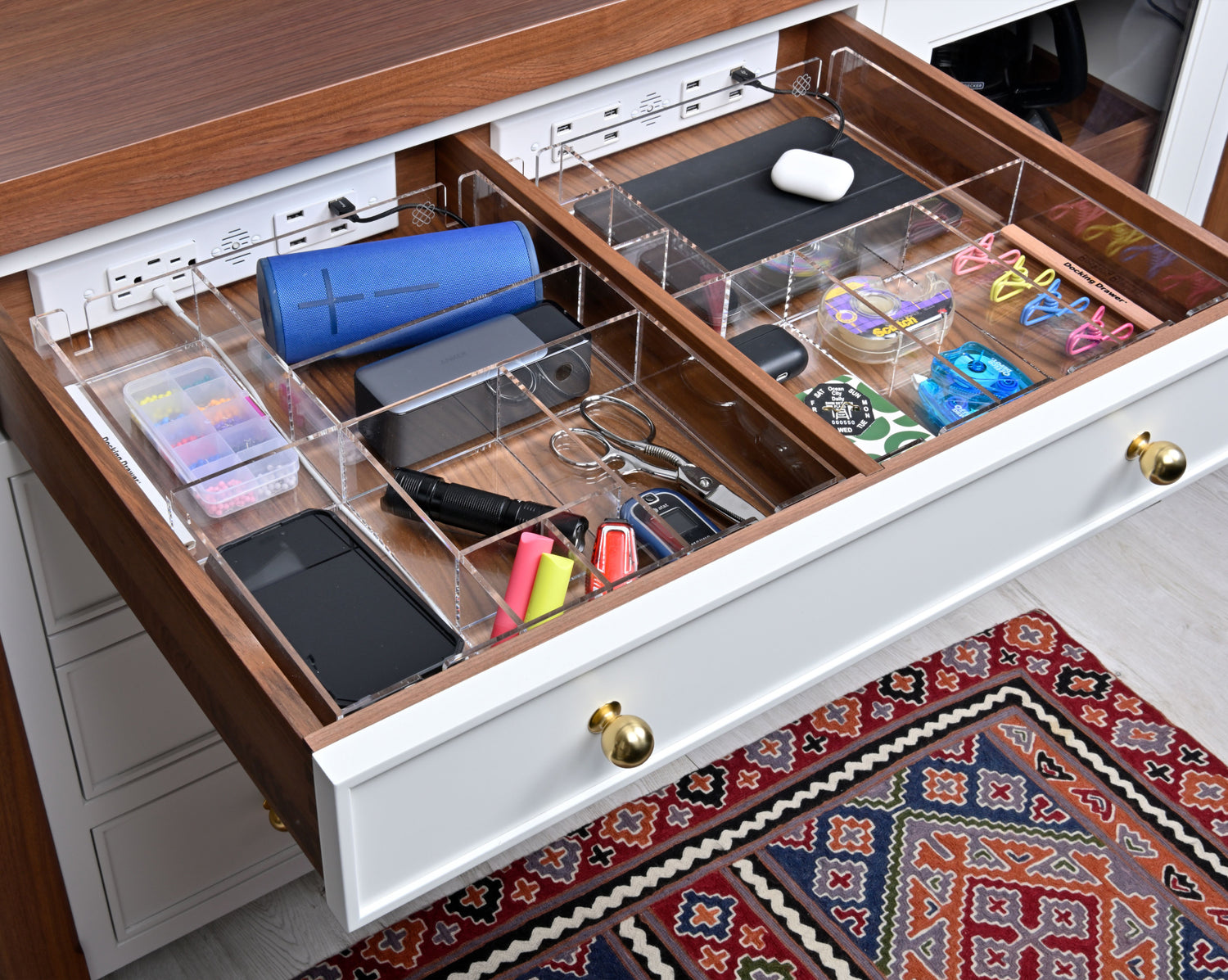 Tech drawers with acrylic custom-fit organizers that leave space for charging cords in back.