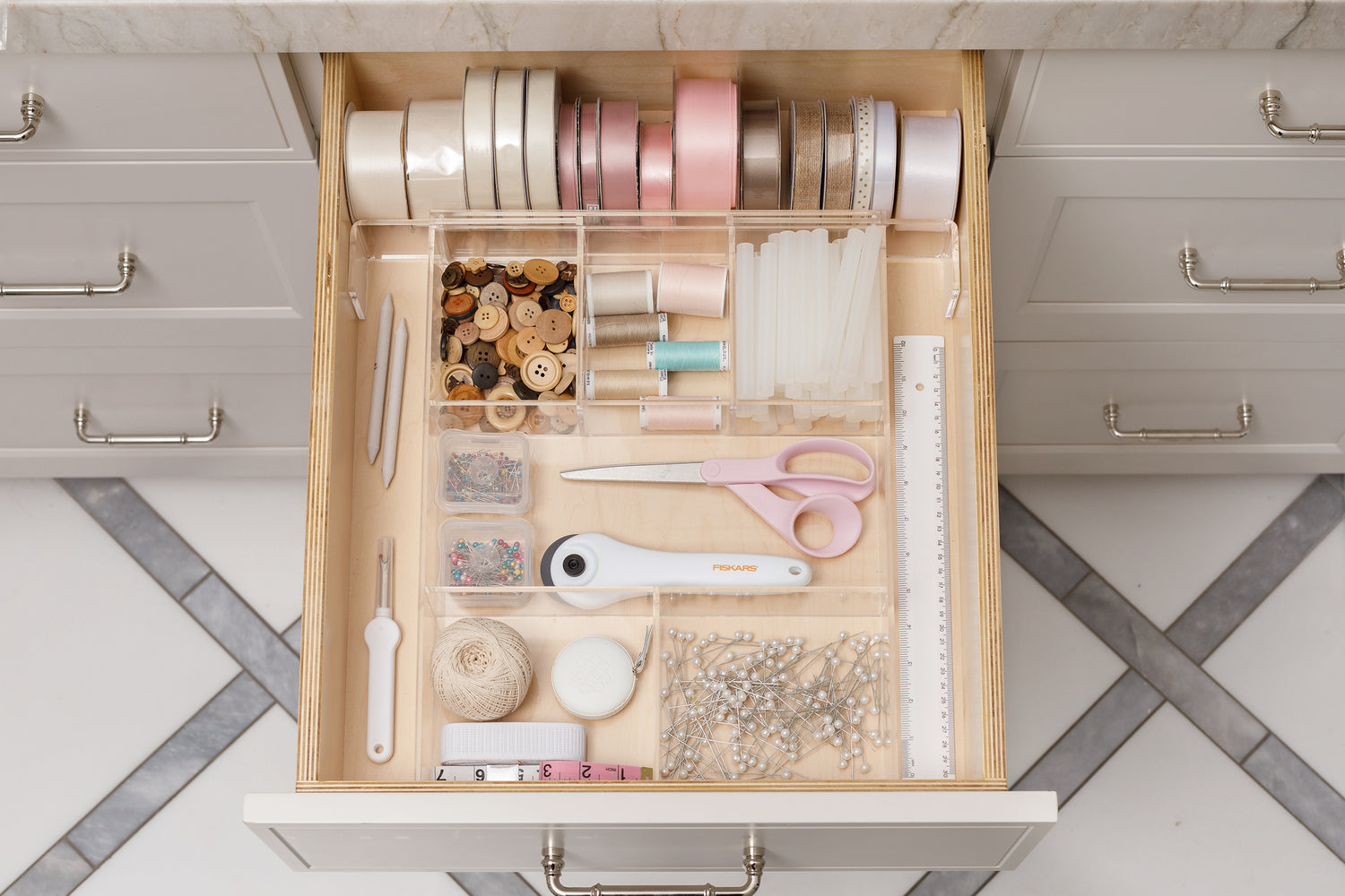     * Darling craft drawer organized to perfection with an acrylic Expandable Drawer Organizer.