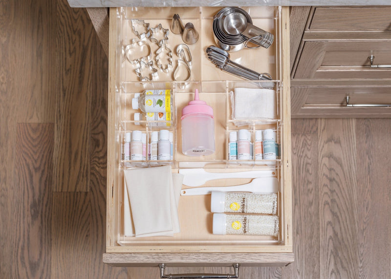 Drawer filled with cake decorating tools organized with a Mandy custom-fit organizer.