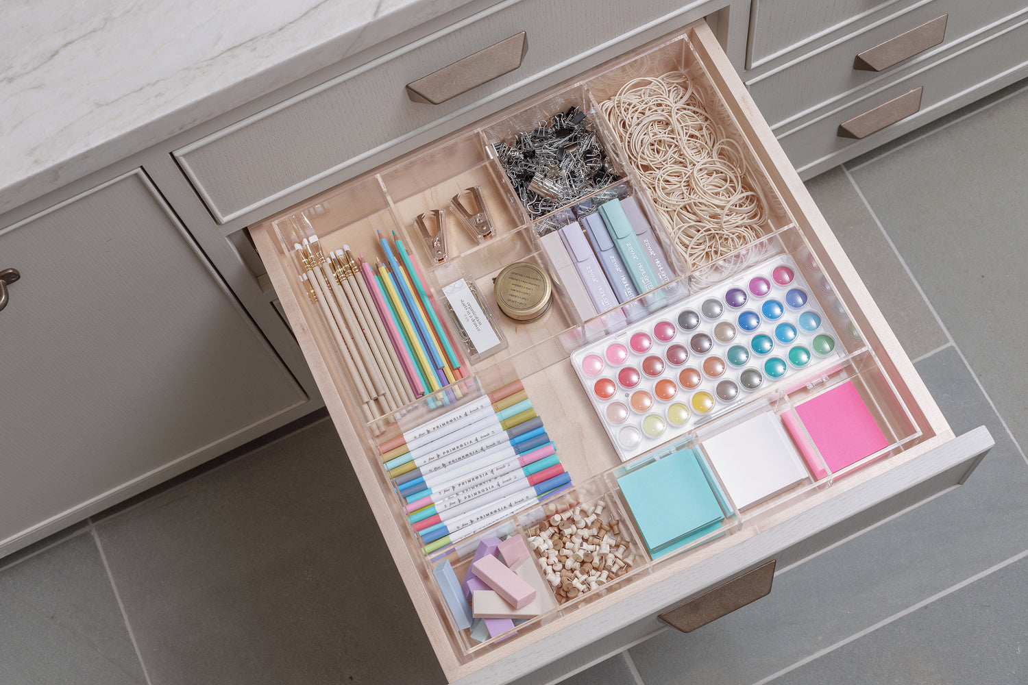 Colorful craft drawer neatly organized with the Nathan acrylic drawer organizer.