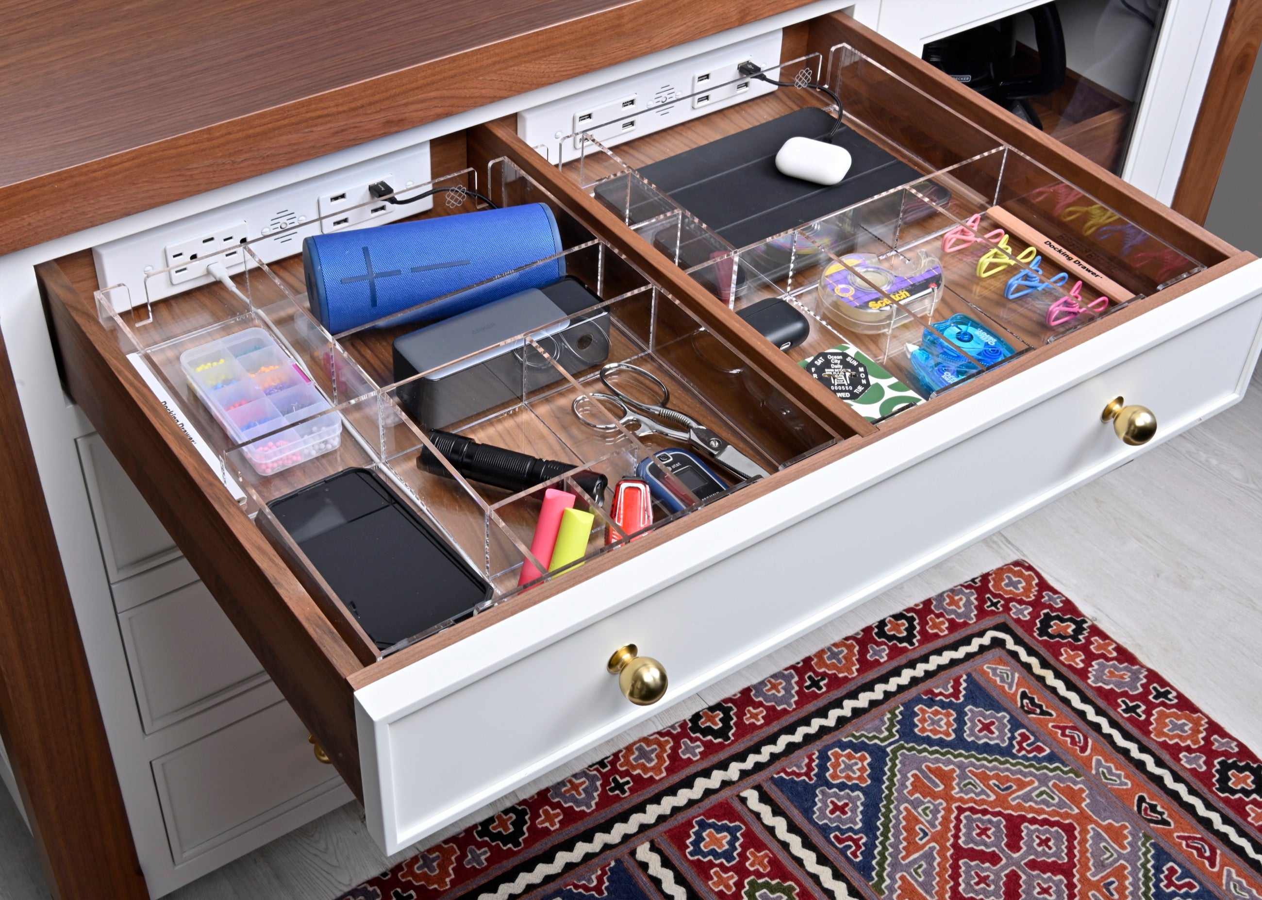 Tech drawers with acrylic custom-fit organizers that leave space for charging cords in back.